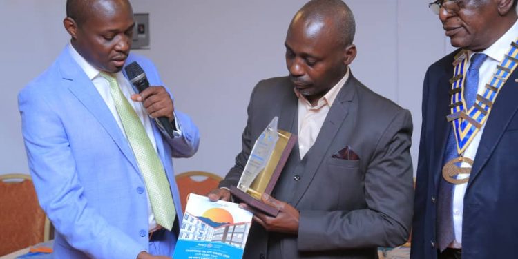 Bukoto Rotary Club Awards Mulago Neurosurgeon Muhumuza