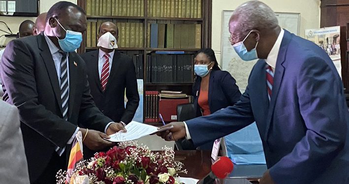 Katureebe hands over office; “There’s time for Everything under the Sun”
