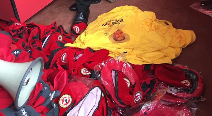 Photos: Security recovers Museveni’s campaign T-shirts hidden in NUP offices