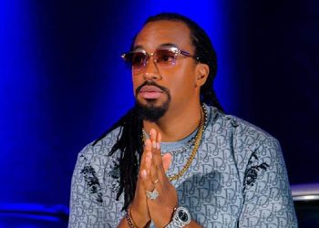 Fans roast Navio for Posting photo of Bobi Wine and Museveni