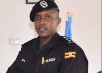 Rogue cop Filmed slapping Female supermarket Attendant has Violent past: He once Forced his Car into Liquor Shop in Ntinda 