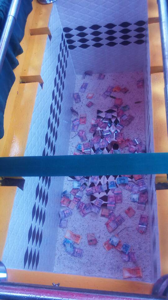 Ivan Ssemwanga’s body buried with champagne, money