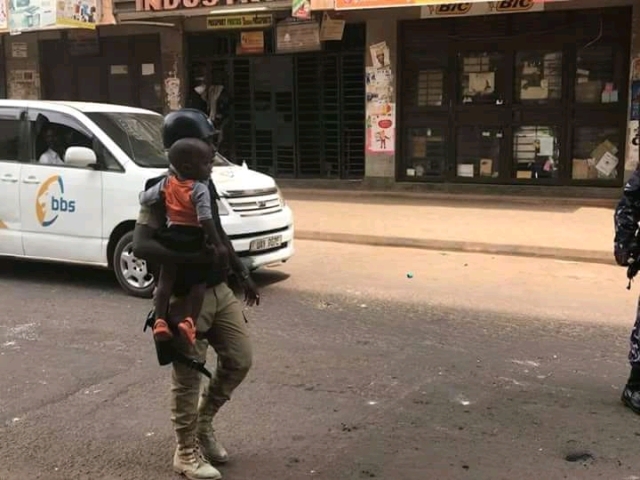 Cop who saved baby from Bobi Wine’s Red Army Rioters Identified 