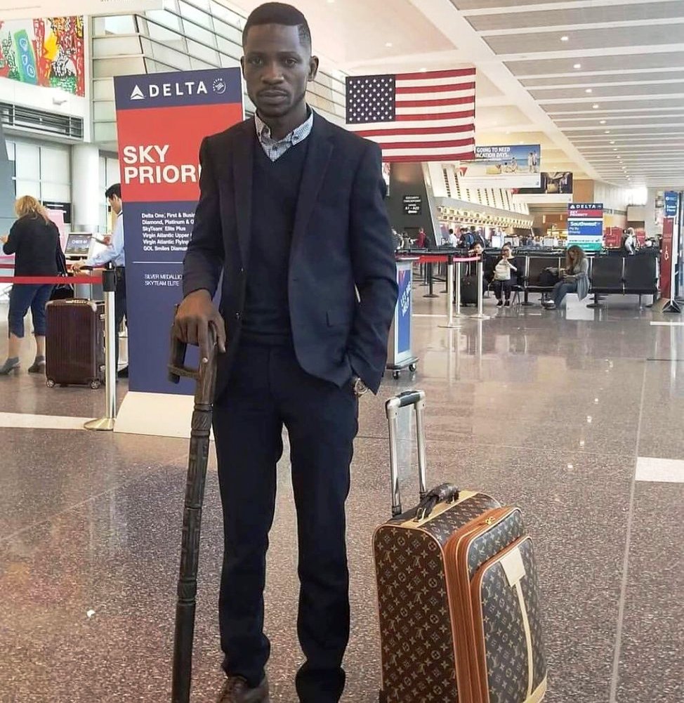 Breaking: Bobi Wine Forced into Police Van at Entebbe Airport