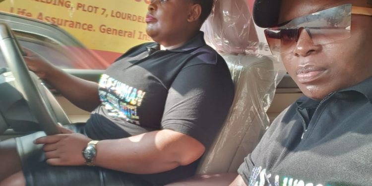 Video: Kusasira Films herself with Bundles of Money tells Bobi Wine Supporters to Wait for their Regime