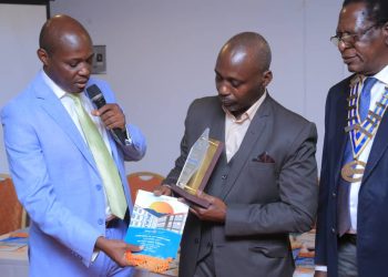 Bukoto Rotary Club Awards Mulago Neurosurgeon Muhumuza