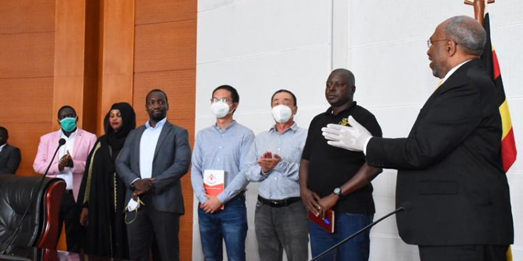  PM Rugunda Hails Chinese Firm Huangpai Food Machines for its Donation Towards COVID-19 Taskforce