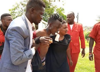What Happened? Dan Magic wasn’t Shot. He fell off Bobi Wine’s car in Attempt to Knock cops