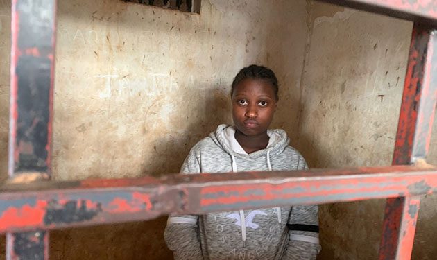 Exclusive Photos: Woman filmed Clobbering friend for Sleeping with her Boyfriend arrested